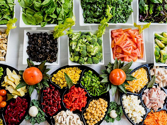 Trays with food of all colors.