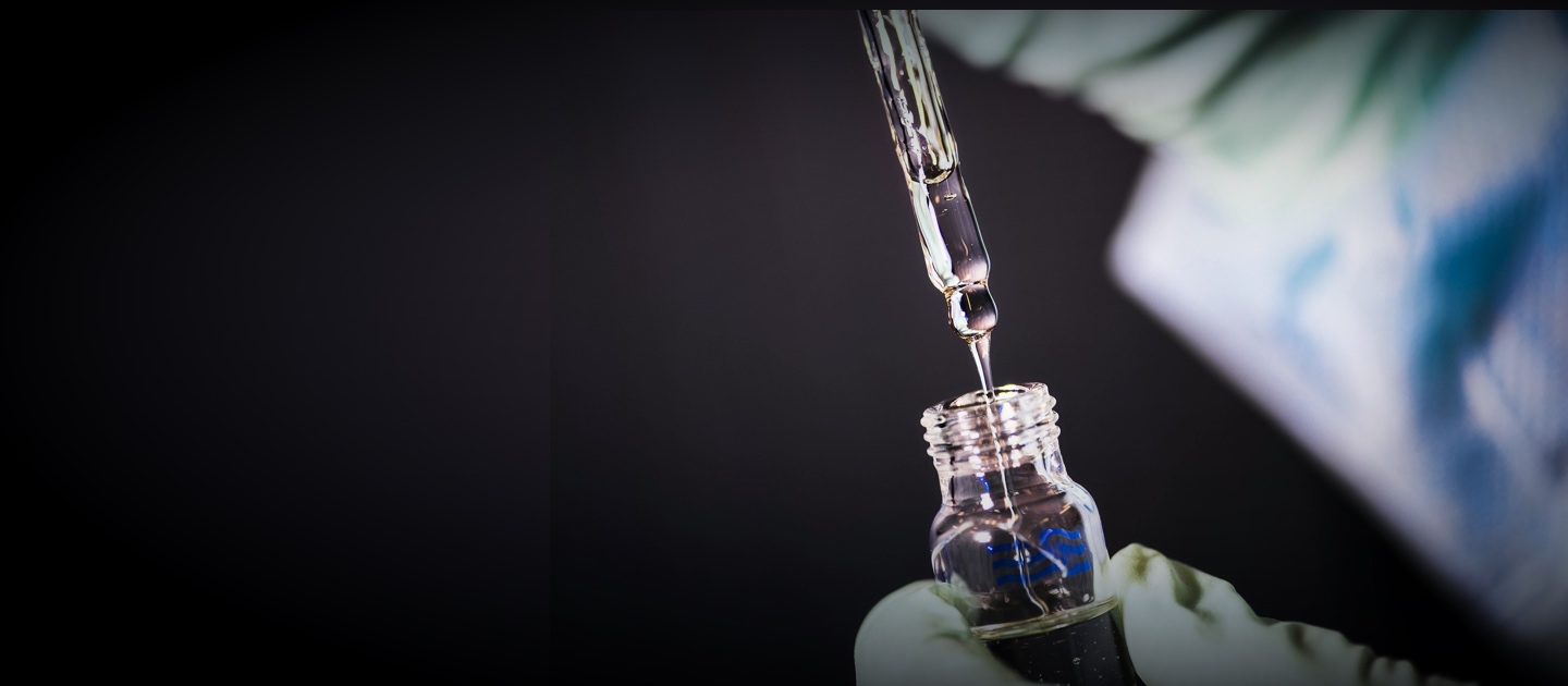 Syringe pulling out a drug