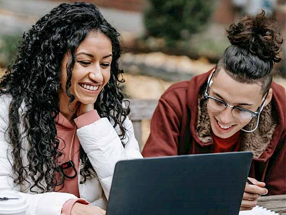 Students working on a laptop