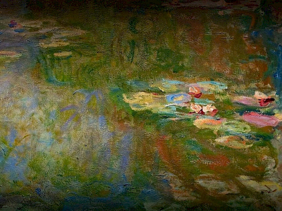 a painting of water lilies in a pond