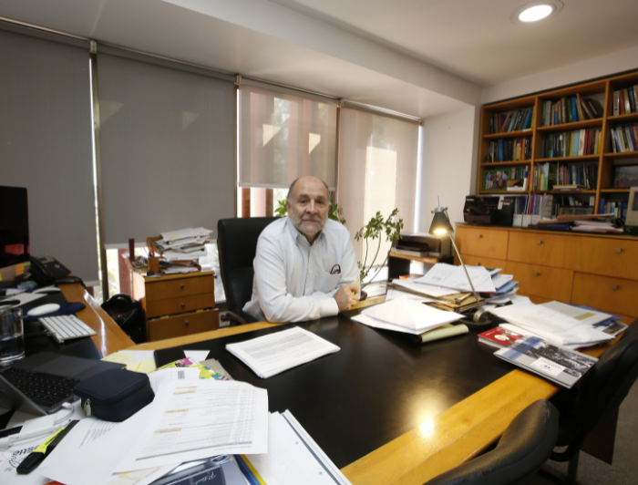 Luis Cifuentes on his desk.