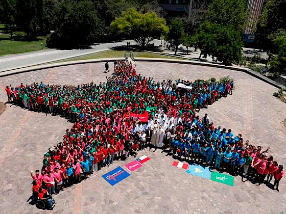 A group of volunteers forming a human star