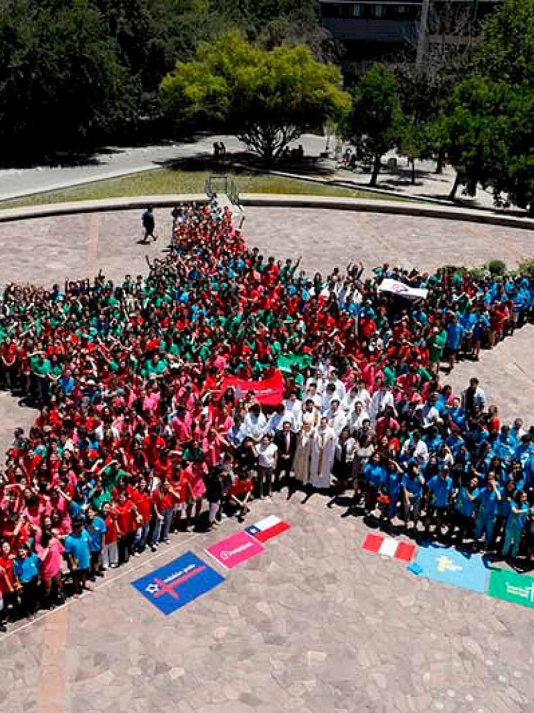 A group of volunteers forming a human star