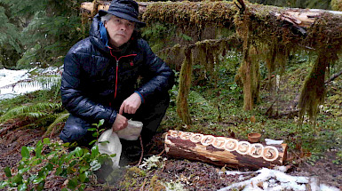 Professor Luis Prato in a forest.
