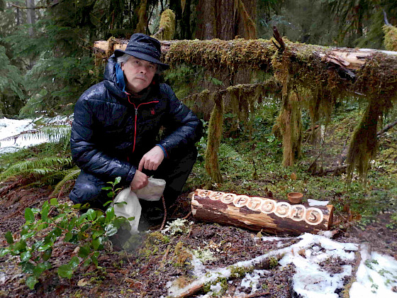 Professor Luis Prato in a forest.