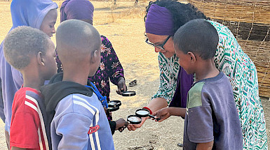 A teacher teaching children in Chad