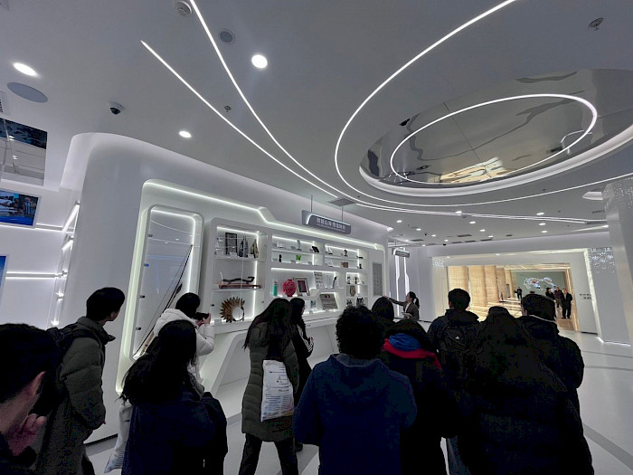 Students visiting the exhibition hall of State Grid