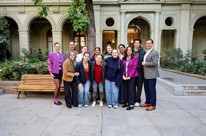 Tufts University officials alongside students from the “Intercultural Approaches for Public Health” program at UC Chile’s Casa Central