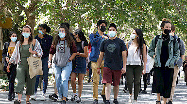 students walking around the San Joaquin Campus