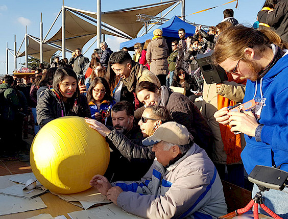 Using a giant plastic ball, astronomers explain the eclipse in 2019.
